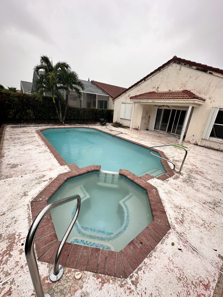 Before power washing - pool deck